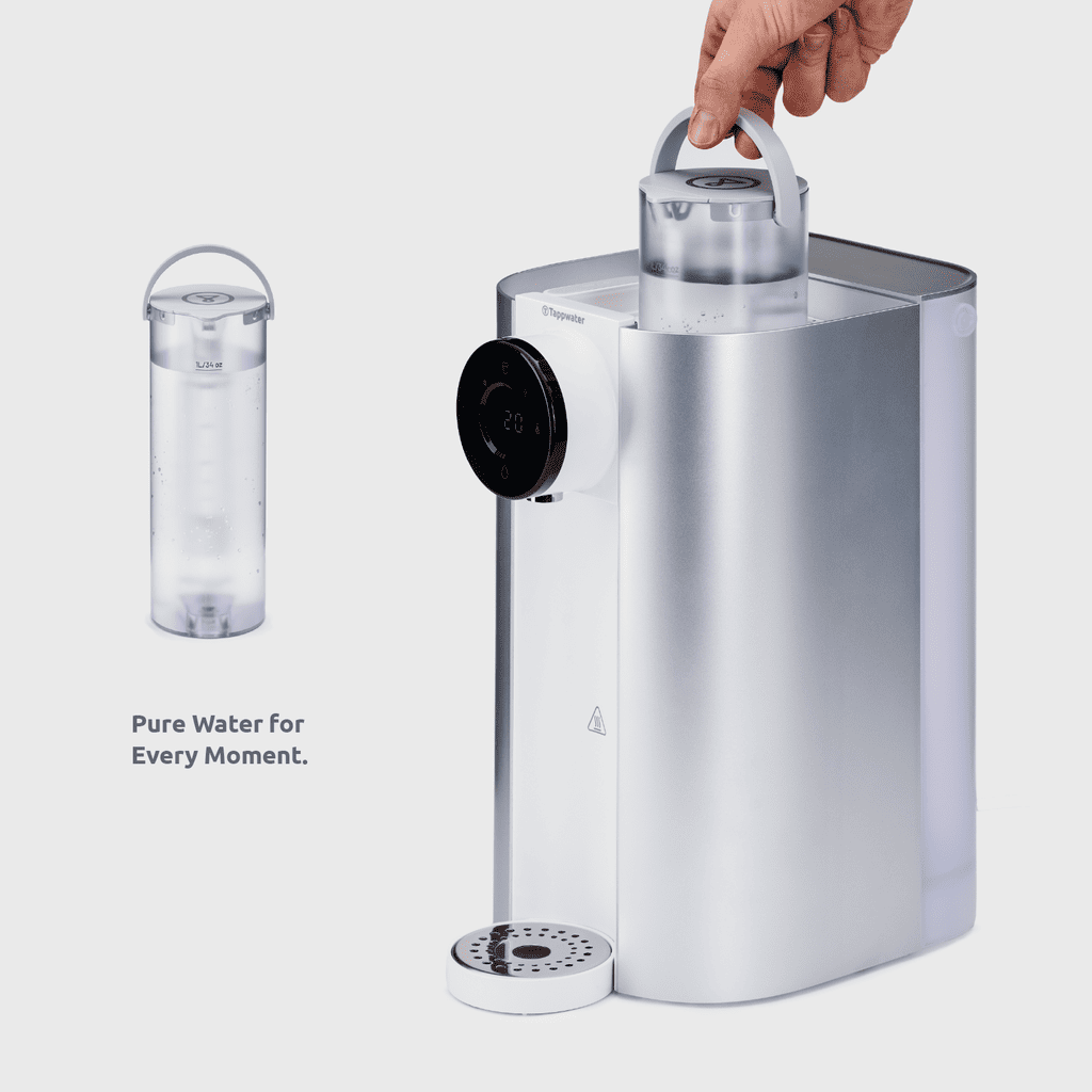 Water filtration system with a hand holding a filter cartridge on a white background