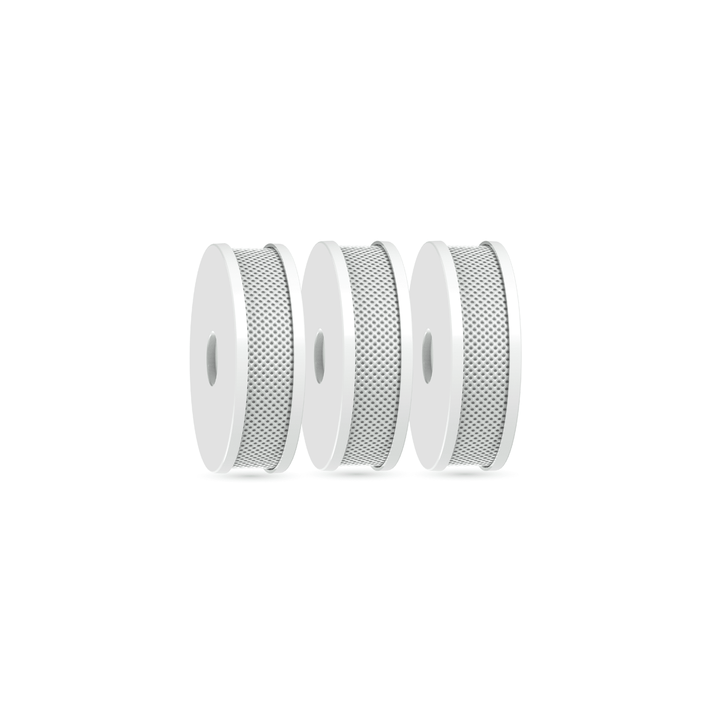 Three white spools with silver mesh on a white background
